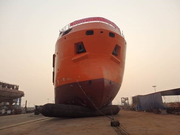 Sun setting on launch barge. Floodlights being rigged up for tonight’s operation.