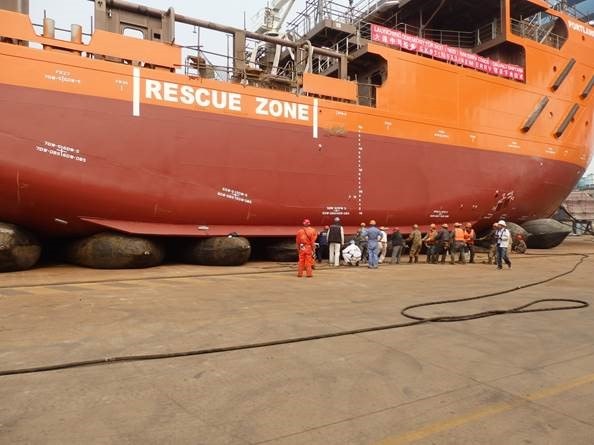 Having a game of tug-o-war with a balloon